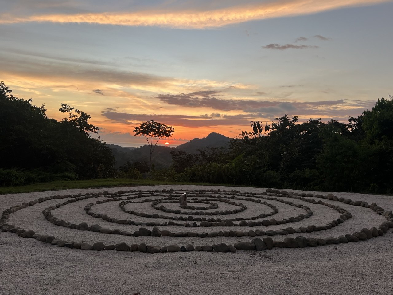 Stone spiral labyrinth at Castillo del Sol at sunset